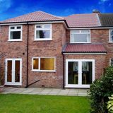 Two-storey rear extension on a brick semi-detached house in London