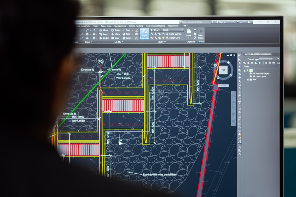 Issued structural drawing being checked by a London chartered engineer